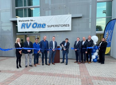 Jon Ferrando, CEO and President, cutting ceremonial ribbon in front of the new RV One Superstores Jacksonville.