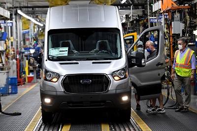 A picture of Ford workers building a Transit at the company's Kansas City assembly plant in 2021