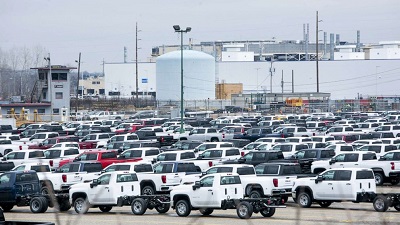 A picture of GM Cars Stacked on Lots