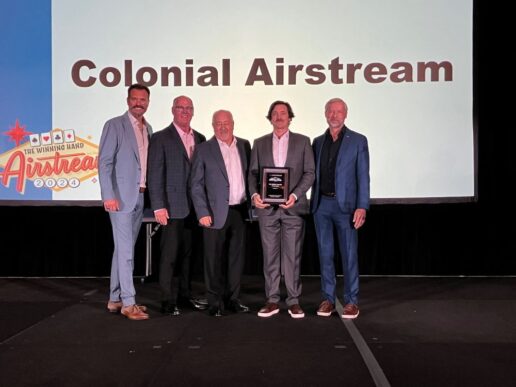 A picture of the Colonial Airstream team at Airstream's awards dinner at Caesar's Palace in Las Vegas.