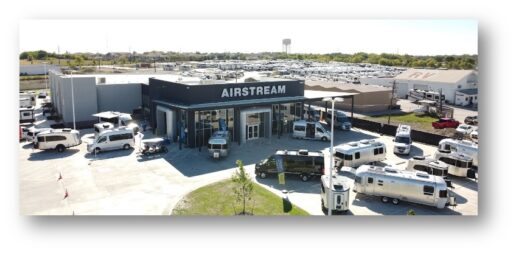A picture of a Blue Compass Airstream dealership.