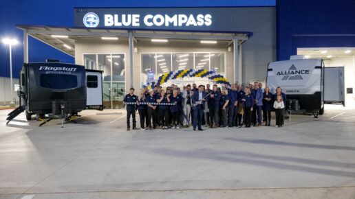 A picture of Blue Compass employees celebrating the opening of the Austin location.