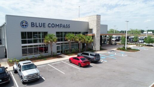 A picture of a Blue Compass RV dealership.