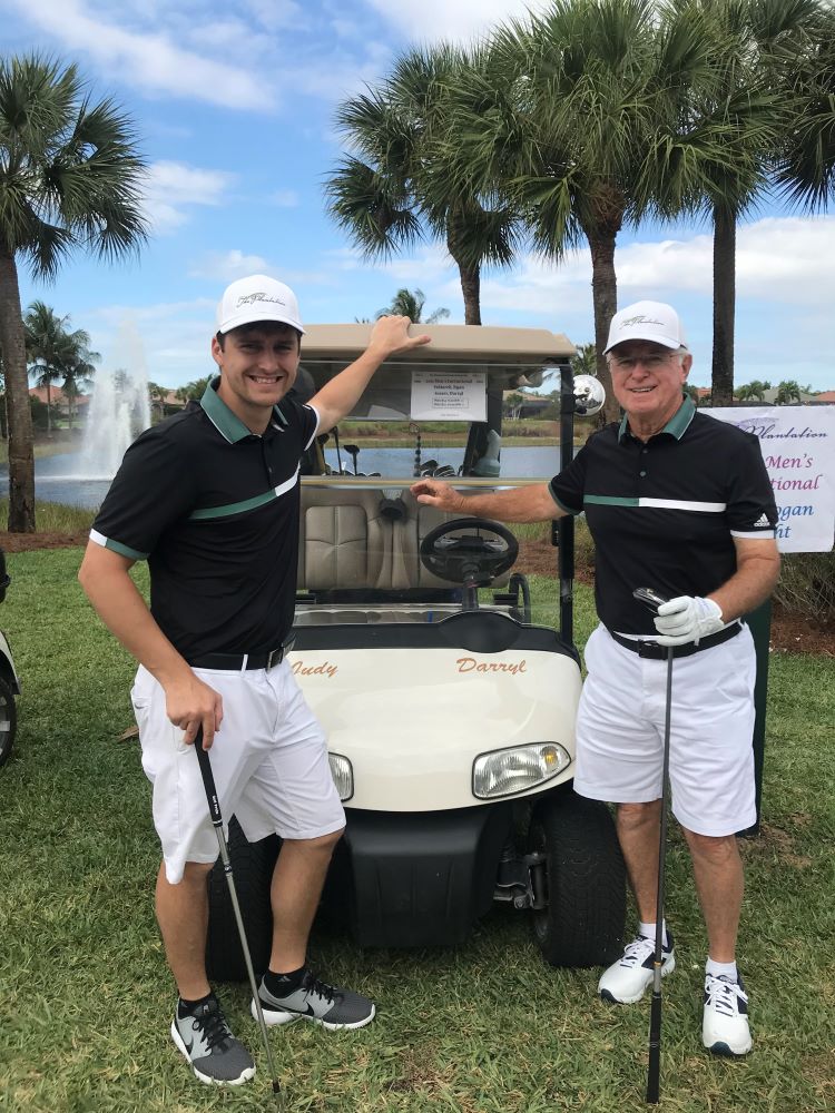 A picture of RV/MH Hall of Fame President Darryl Searer (R) and his grandson and Hall of Fame Executive Vice President Ryan Szklarek on the golf course.