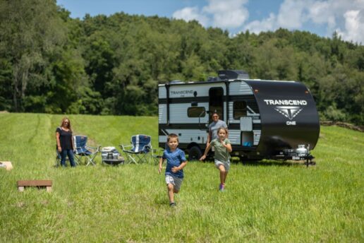 A picture of a family camping with the 2025 Transcend One.