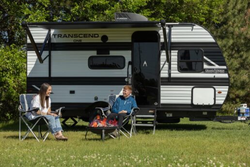 A picture of a couple camping with the 2025 Transcend One.