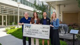 A picture of Voyager RV's donation check to the KGH Foundation.