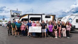A picture of Voyager RV's donation check to the Kelowna Women's Shelter.