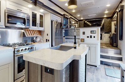 A picture of the interior of a 2023 Redwood RV fifth wheel using the Firefly multiplex system