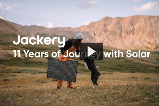 A screenshot of a person carrying a portable solar panel with the words "Jackery, 11 years of Journeys with Solar" over top of the image.