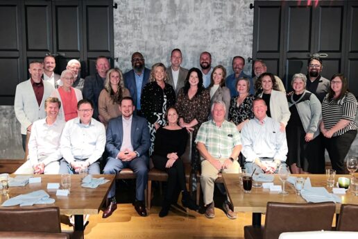 A group picture of attendees at nuCamp's 2023 Dealer Summit event in Charleston, South Carolina.