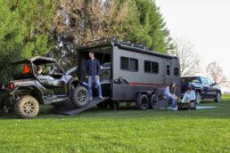 A picture of the 2024 inTech Flyer Forge trailer loading up a UTV.