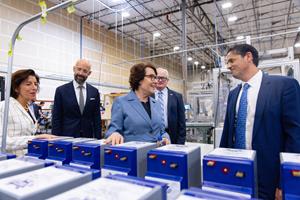 A picture of Dragonfly CEO Denis Phares (R) giving Secretary of Commerce Gina Raimondo (L) and Nevada Sen. Jacky Rosen (C) a facility tour.