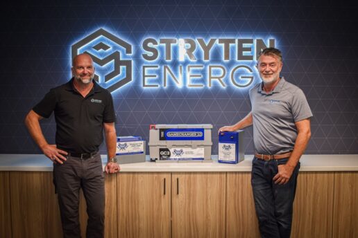 A picture of Stryten Energy President and CEO Mike Judd and President (left) and Stryten Energy Executive Vice President and Chief Financial Officer Petar Oklobdzija stand next to Battle Born Batteries.