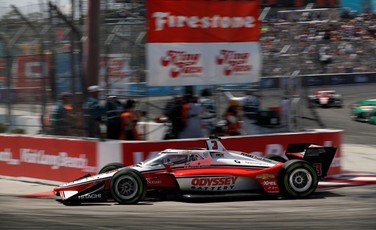 A picture of an Odyssey Battery-Branded Team Penske racecar.