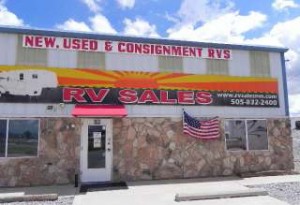 A picture of the storefront of RV Sales, an RV dealership in Moriarty, New Mexico.