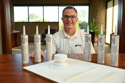 A picture of Dicor national OEM sales manager Matt Grierson with Dicor's new 502 self-leveling sealant.