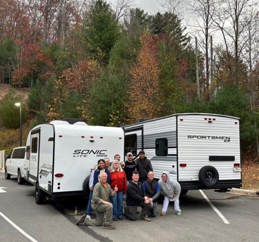 A picture of Hurricane Helene volunteers who used travel trailers donated by KZ RV.