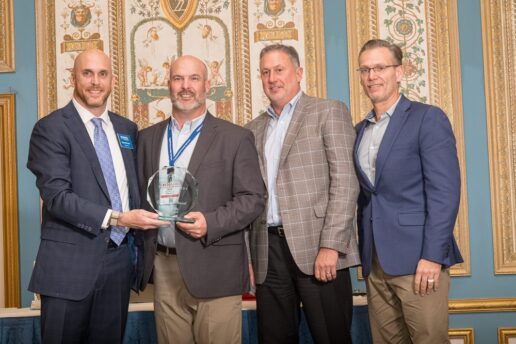 A picture of Winnebago's Circle of Excellence Award. (L to R) RVDA chairman, Winnebago Director of Sales Zach Raulie, Winnebago VP of Sales Niles Whitehouse and Winnebago President Chris West.