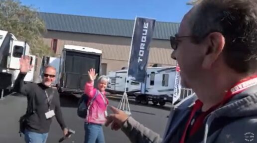 A picture of a screenshot of a video from content creator Traveling Robert during Industry Day at the 2025 Florida RV SuperShow in Tampa.