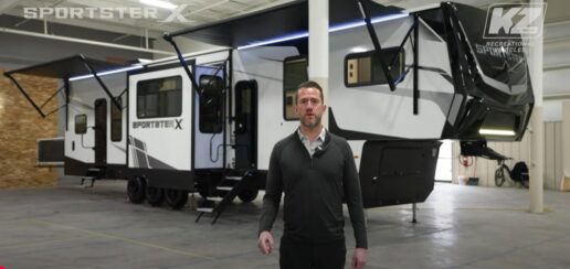 A screenshot of a video featuring KZ RV's Nick Francis in front of a Sportster X 3915X before beginning a walkthrough of the RV.